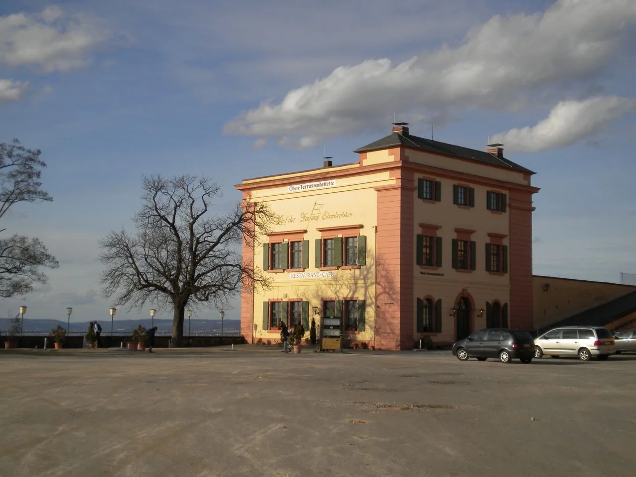 Charming historic building with a pastel facade in a tranquil setting in Koblenz, Germany.