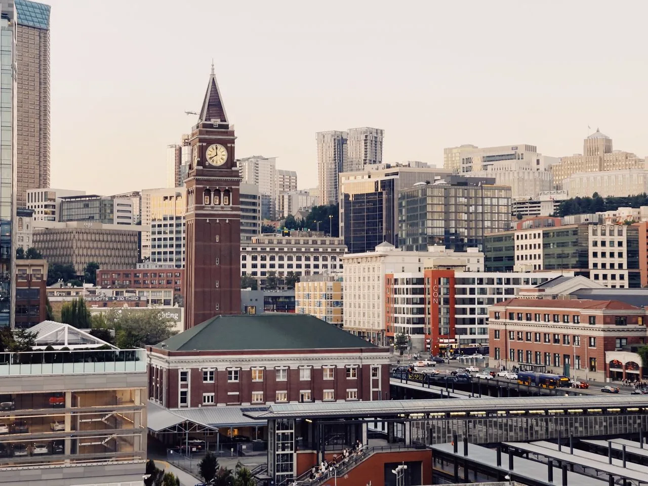 A scenic view of Seattle's downtown skyline featuring the historic Smith Tower with modern urban architecture.