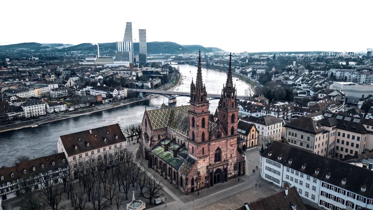 Stunning aerial view of Basel Minster, a Gothic landmark in Basel, Switzerland.